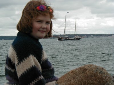 Anna in front of old ship